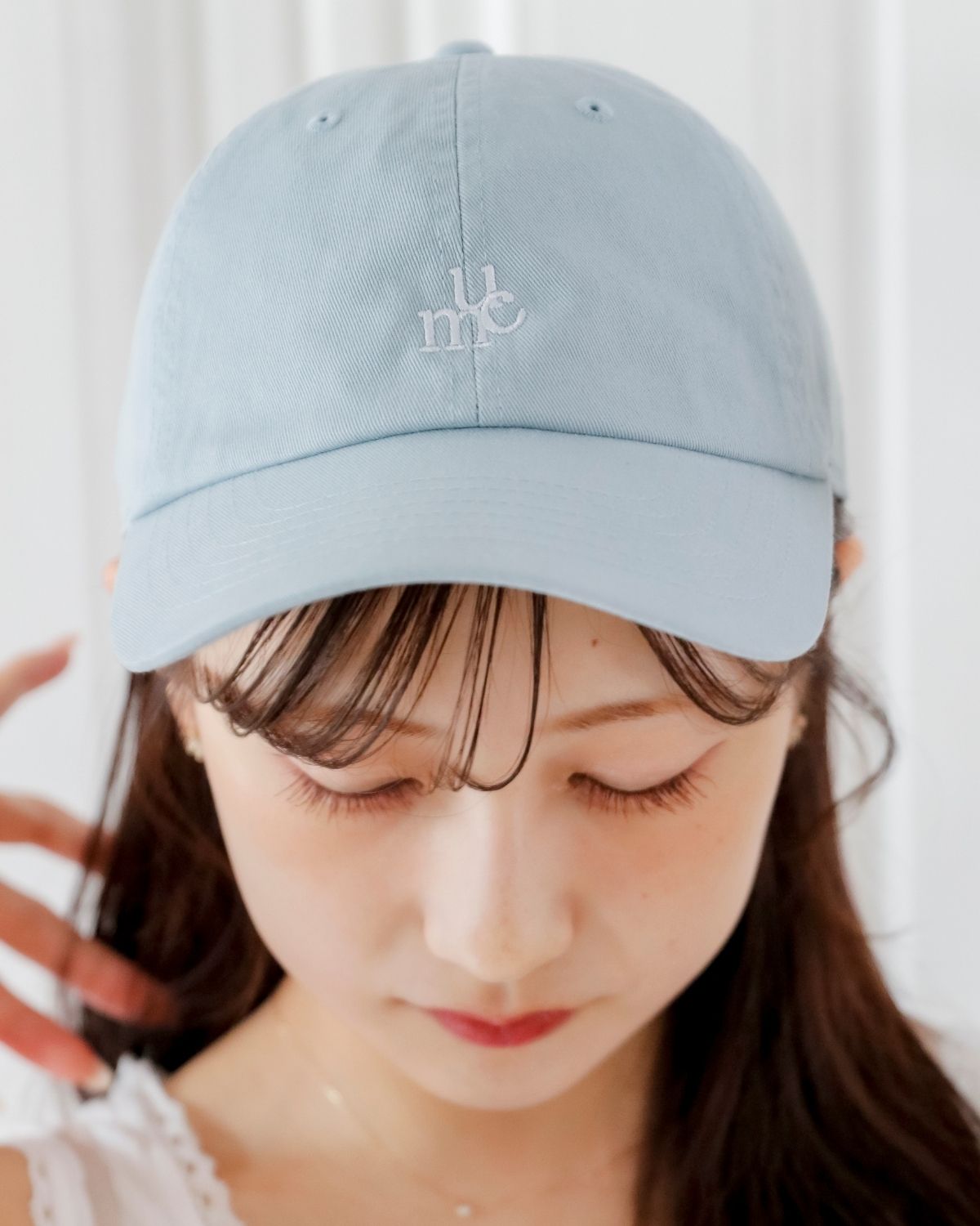 umm. logo cap
